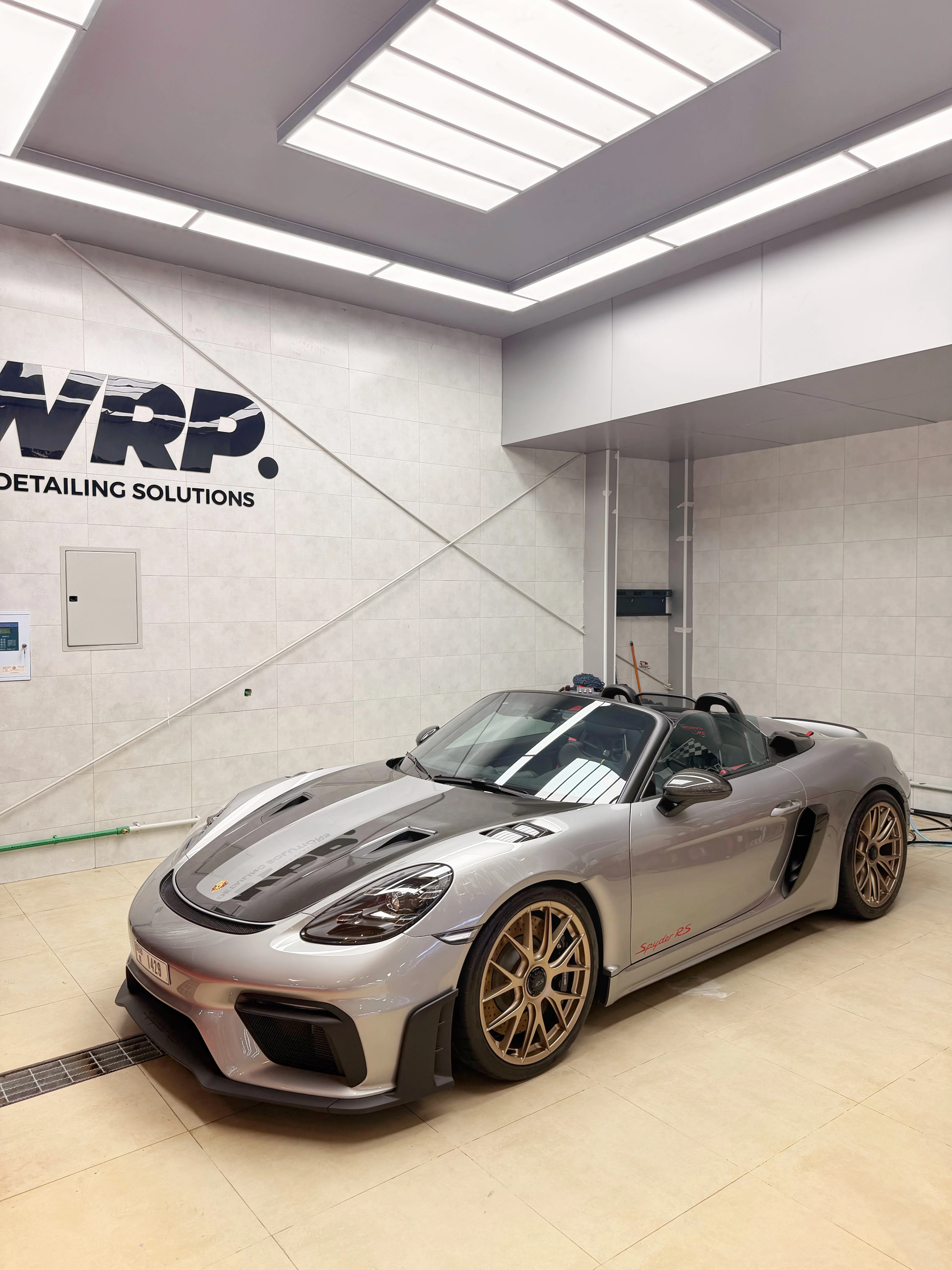 Porsche Boxster Spyder with paint protection film installation at WRP Dubai showroom